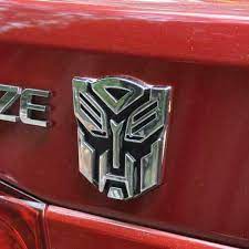3D Transformer Car Badge Metal Logo – Premium Emblem for Auto Styling | MS Auto Shop